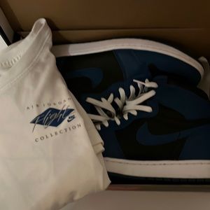 Air Jordon 1 Marina blue shoes with Jordon matching shirt. The shirt is an XXL